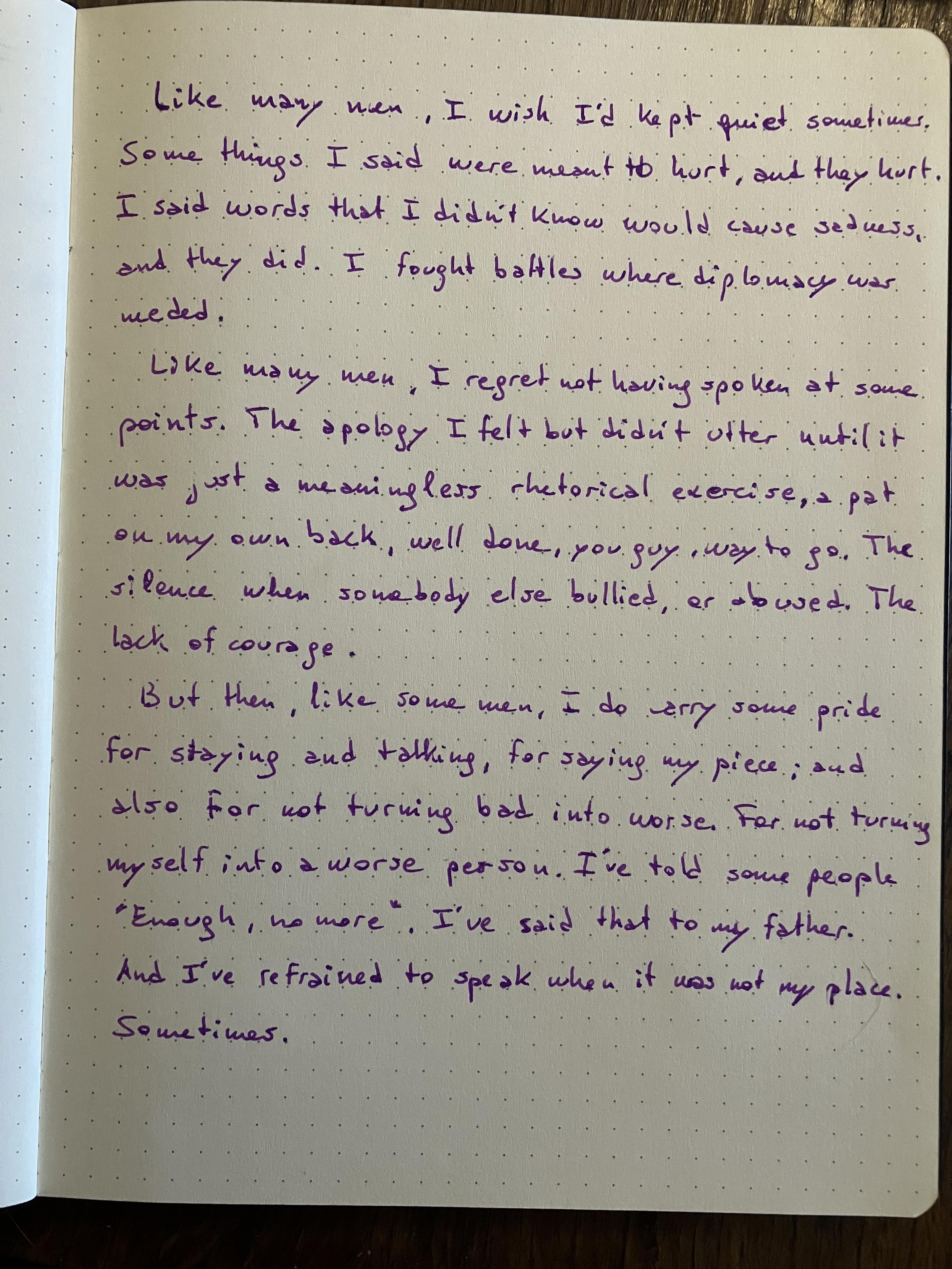 A notebook page with the text of the post, written in purple ink with a fountain pen